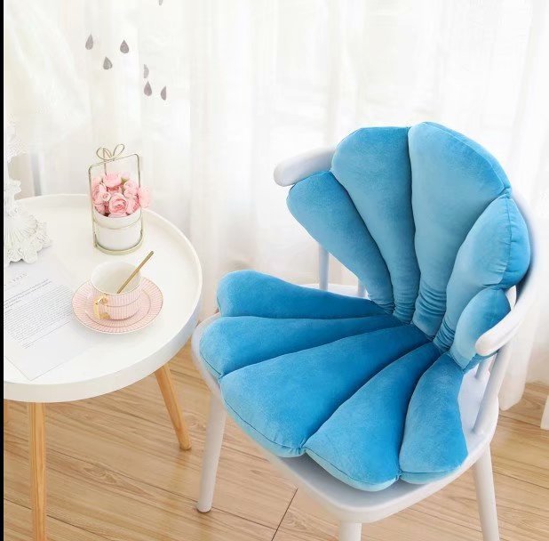 VibeCore Seashell Seat Cushion in Blue. This seashell-shaped cushion is crafted from soft velvet plush fabric and filled with PP cotton, offering both comfort and style. Perfect for adding a refreshing coastal vibe to any seat or space.