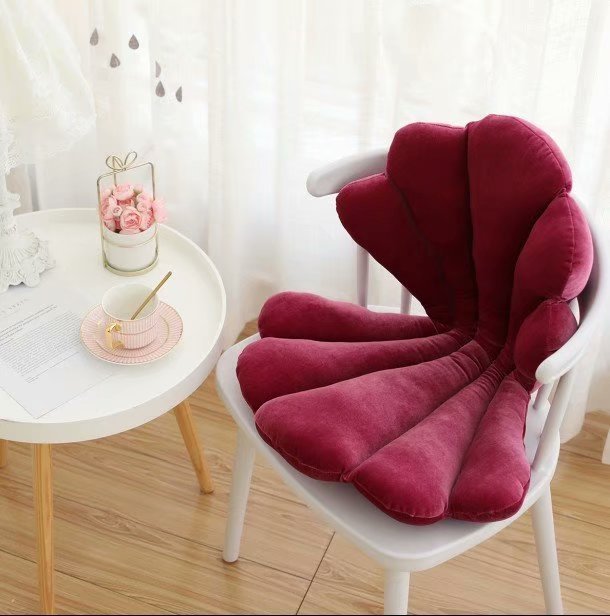 VibeCore Seashell Seat Cushion in Burgundy. Designed in a charming seashell shape, this cushion is made from soft velvet plush fabric and filled with PP cotton for a supportive, cozy feel. A perfect way to add a rich, playful touch to any seat or space.
