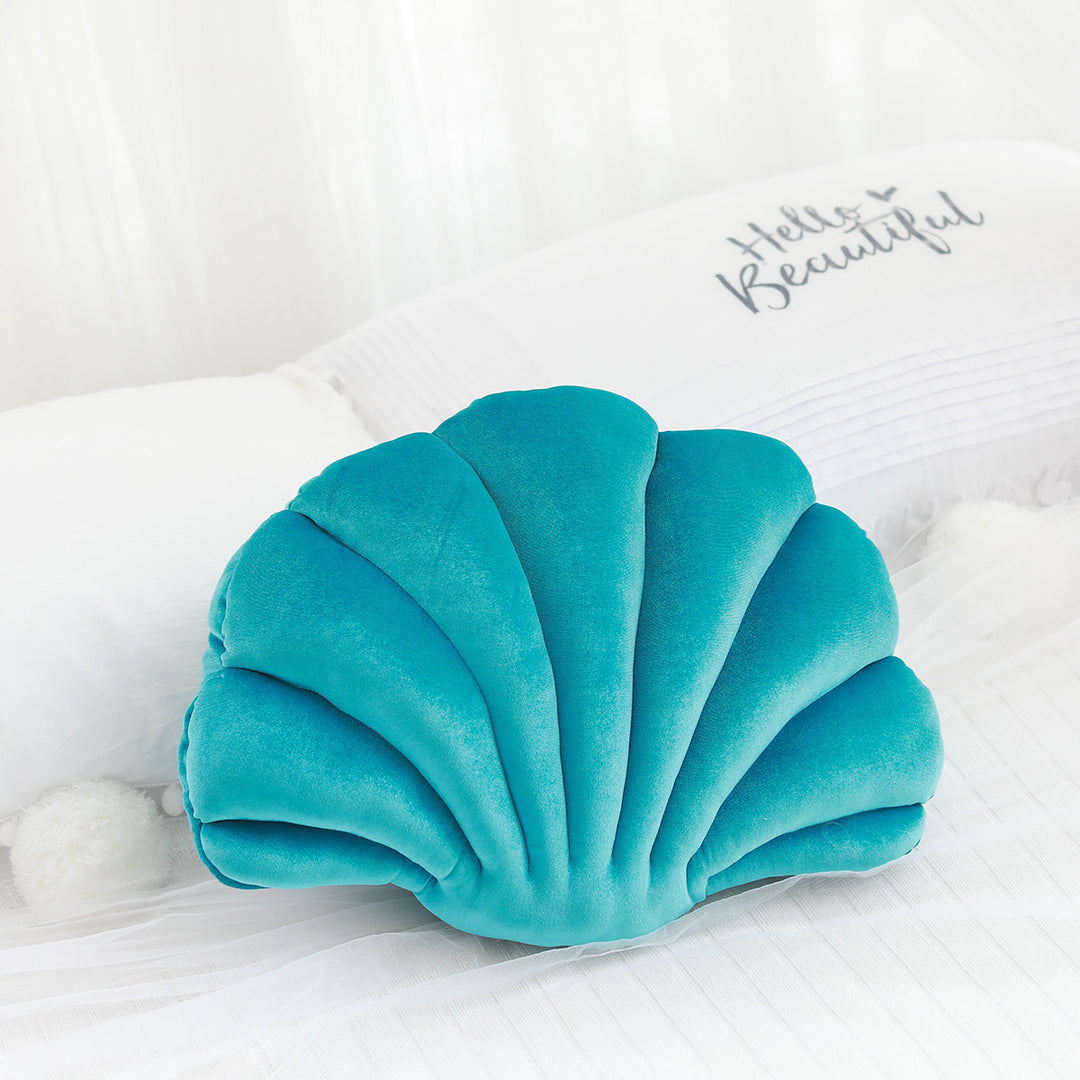 Aqua velvet seashell throw pillow, soft and plush, bringing a refreshing coastal vibe to any room. Aesthetic accent cushion perfect for adding a cool, stylish touch to bedrooms, dorms, or living areas.