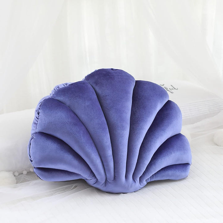 Purple velvet seashell throw pillow, ultra-soft and plush, bringing a coastal-inspired touch to your space. Aesthetic accent cushion perfect for adding comfort and style to bedrooms, dorms, or living areas.