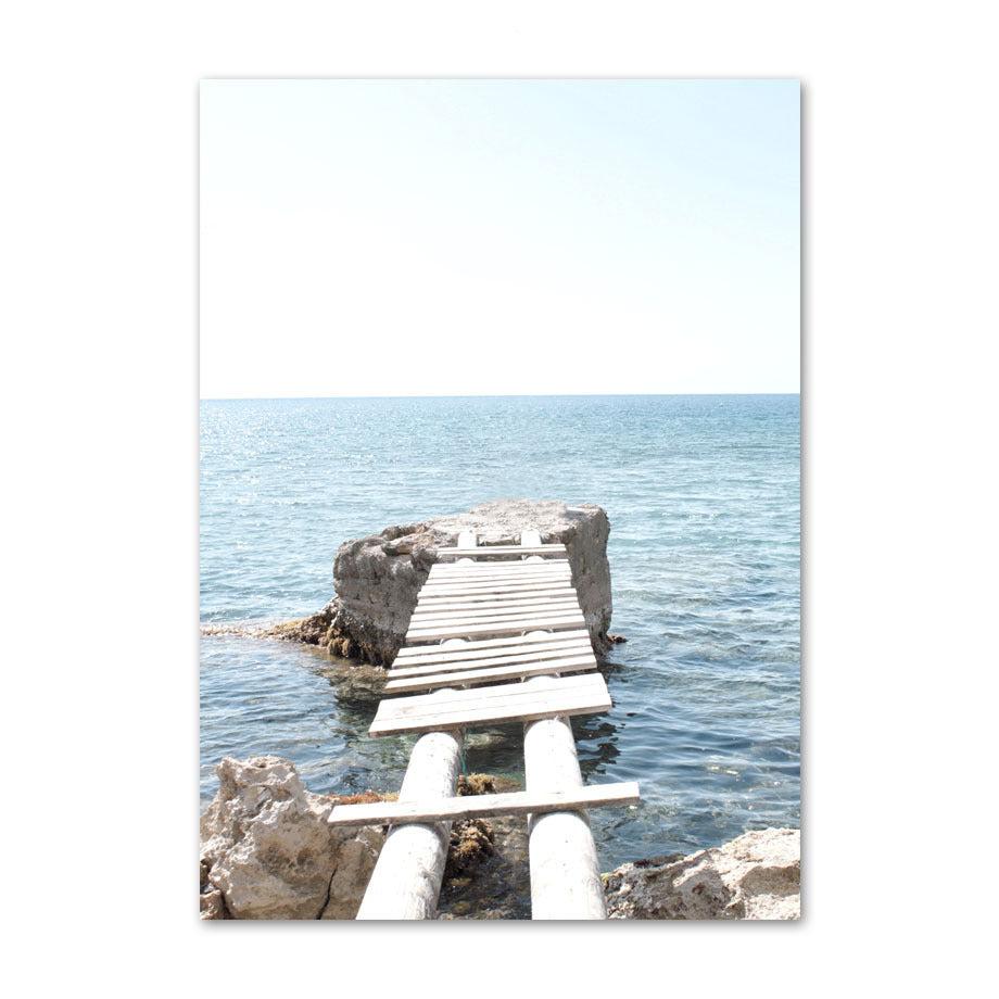 VibeCore Serene Oceanside Canvas Prints Option A: White dock on rock going into the ocean