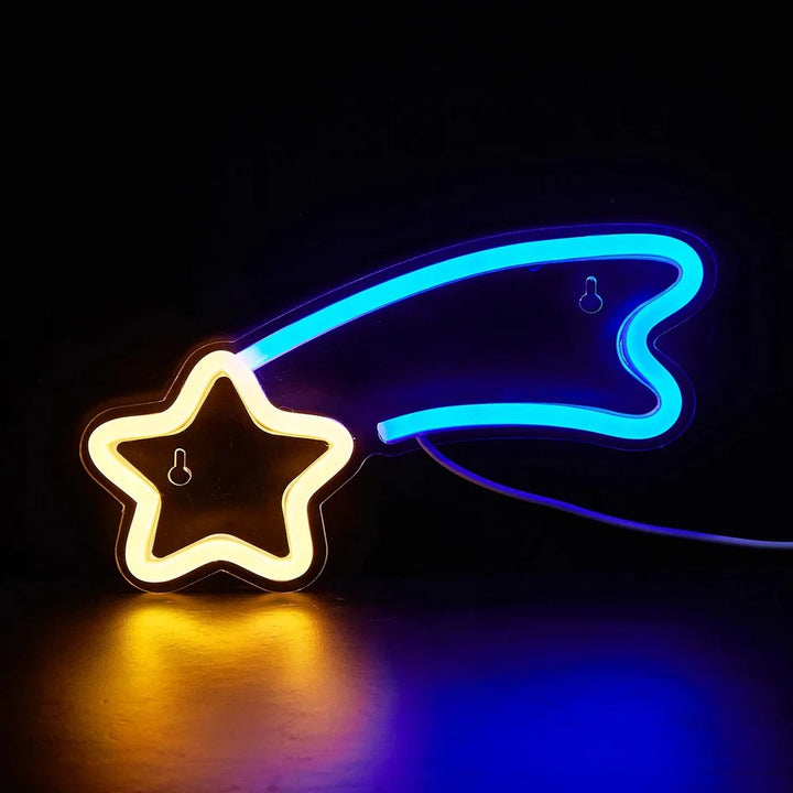 VibeCore Shooting Star Neon Light in blue and yellow, glowing brightly in the dark, adding a celestial and magical ambiance to the space.
