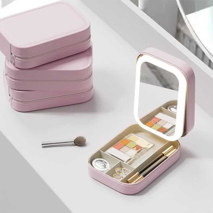 Small Portable LED Mirror Makeup Holder Pink on Vanity with Adjustable Lighting