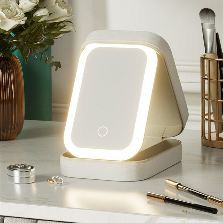 Small Portable LED Mirror Makeup Holder White Set Up on Vanity with Makeup Essentials