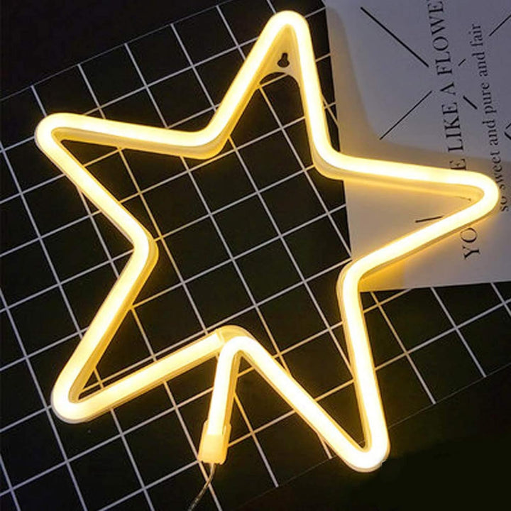 VibeCore Star Neon Light from an aerial view, highlighting its star-shaped design and vibrant glow, perfect for adding a celestial vibe to your space.