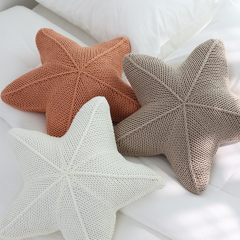 VibeCore Starfish Hand-Knitted Throw Pillow in three colors, showcasing the charming starfish design and adding a coastal, beachy vibe to any space.