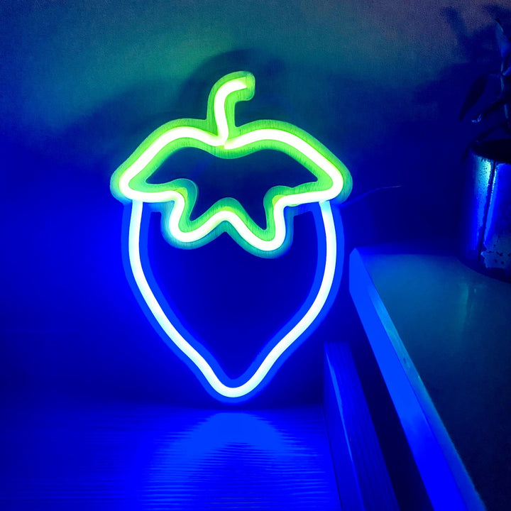 VibeCore Strawberry Neon Light Blue, casting a playful, cool glow that adds a unique touch of color and personality to any space.