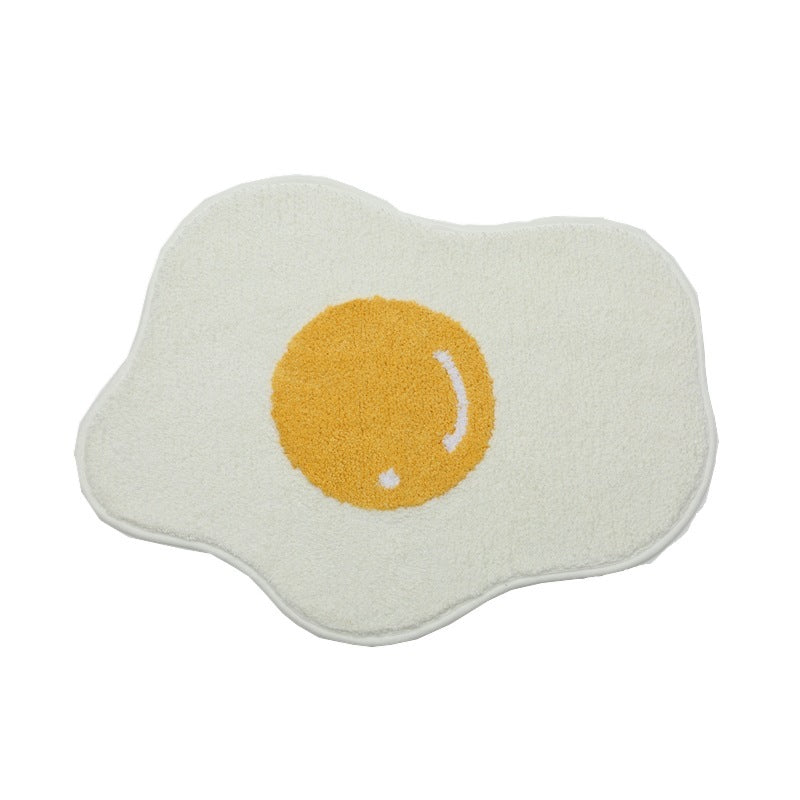 Full product view of the VibeCore Sunny-Side Up Egg Accent Rug, showcasing its playful fried egg design, soft plush texture, vibrant colors, non-slip backing, and cute rug appeal. A quirky, fun rug that adds personality and warmth to any bedroom, dorm, or living room decor.