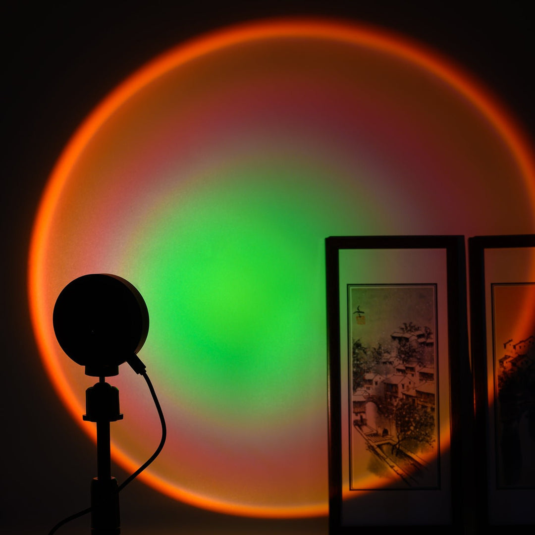 VibeCore Sunset Lamp projecting a green center with an orange exterior on the wall, creating a dynamic and aesthetic lighting effect.