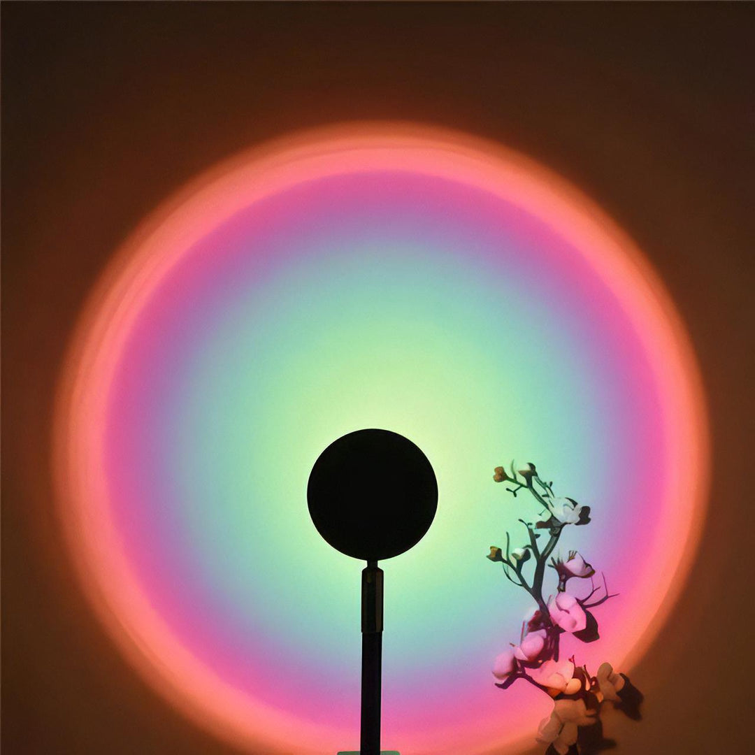 VibeCore Sunset Lamp with a green interior and pink exterior, projecting a vibrant, dreamy light on the wall, perfect for creating a cozy and aesthetic atmosphere.