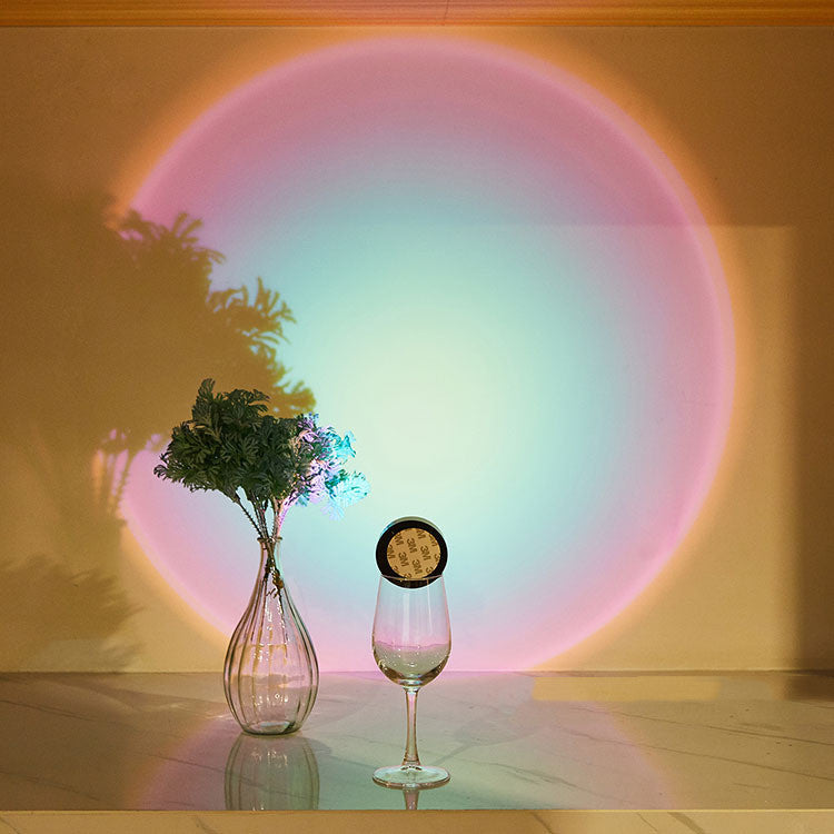 VibeCore Sunset Puck Light displaying a rainbow glow, creating a colorful and cozy ambiance with its compact, touch-activated design.