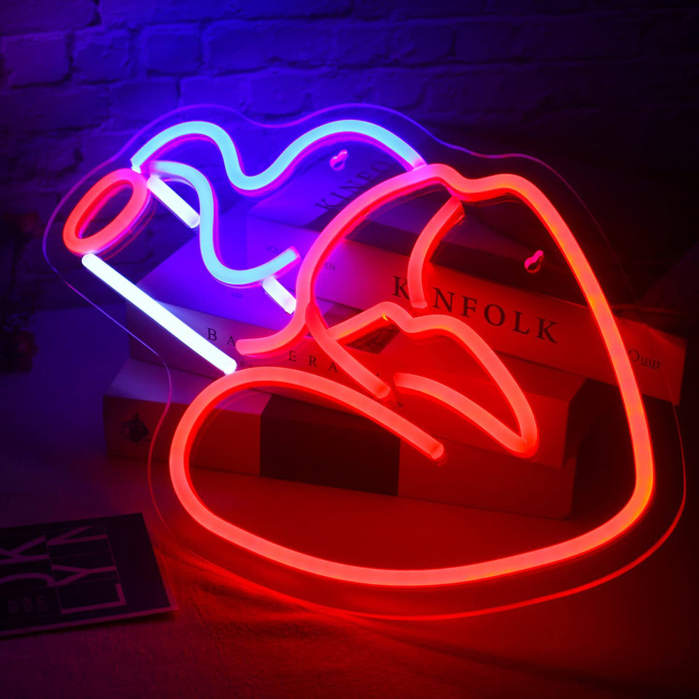 VibeCore Sweet Smoke Neon Light Resting On Books