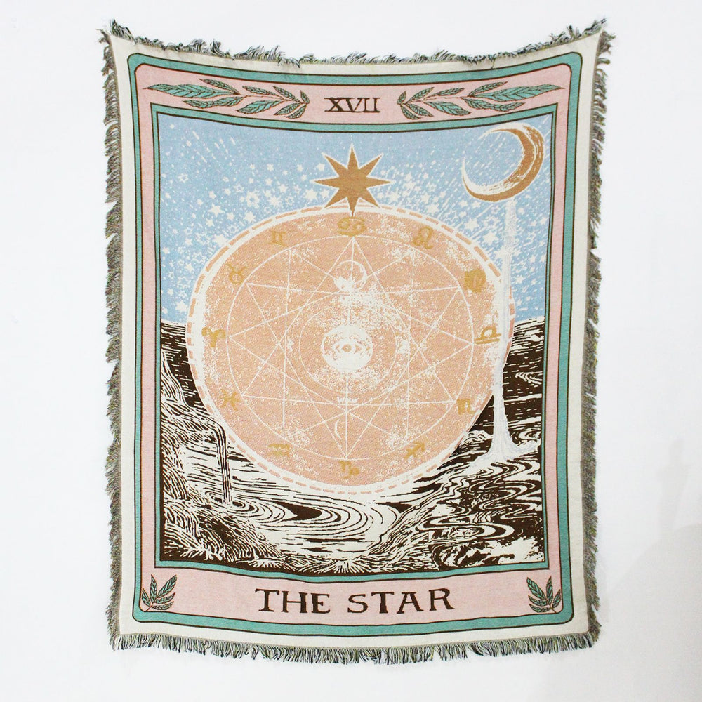 VibeCore The Star Tarot Woven Blanket displayed flat, highlighting its reversible celestial-inspired design with vibrant patterns on soft, breathable 100% combed cotton fabric.
