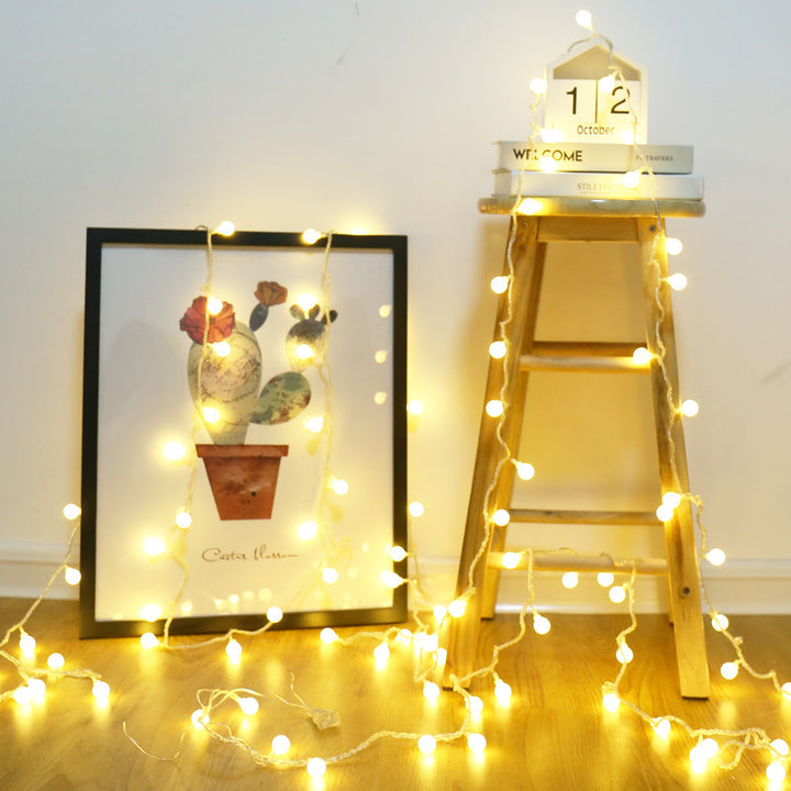 VibeCore tiny ball string lights in room, adding a soft, cozy glow to the space.