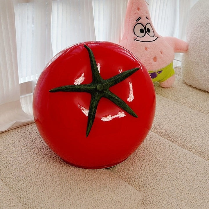 A quirky, tomato-shaped glass table lamp in bold red, unlit and showcasing its vibrant, glossy finish—perfect for eclectic and dopamine decor aesthetics.