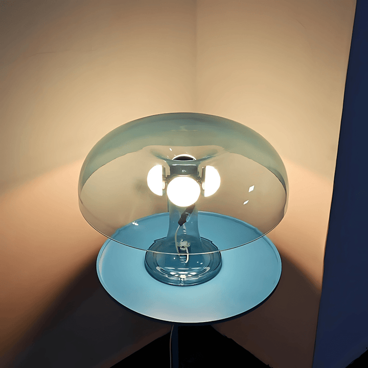 VibeCore Transparent Vintage 60s Mushroom Lamp in blue, lit, glowing with a warm, cozy ambiance, showcasing a retro-inspired design with soft LED lighting.