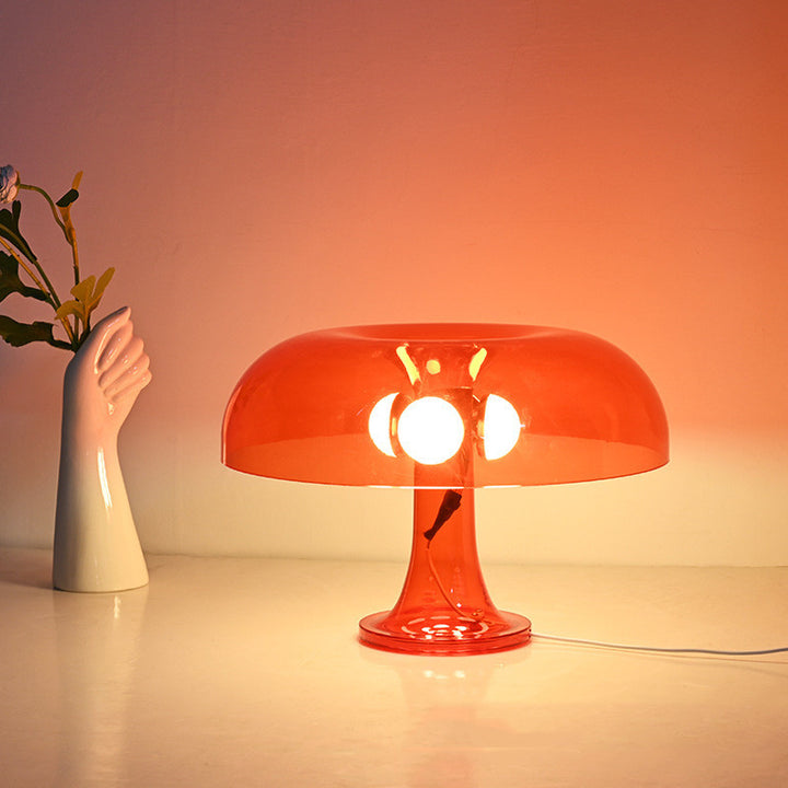 VibeCore Transparent Vintage 60s Mushroom Lamp in red, illuminated with a cozy glow, offering a nostalgic, retro touch to any room.