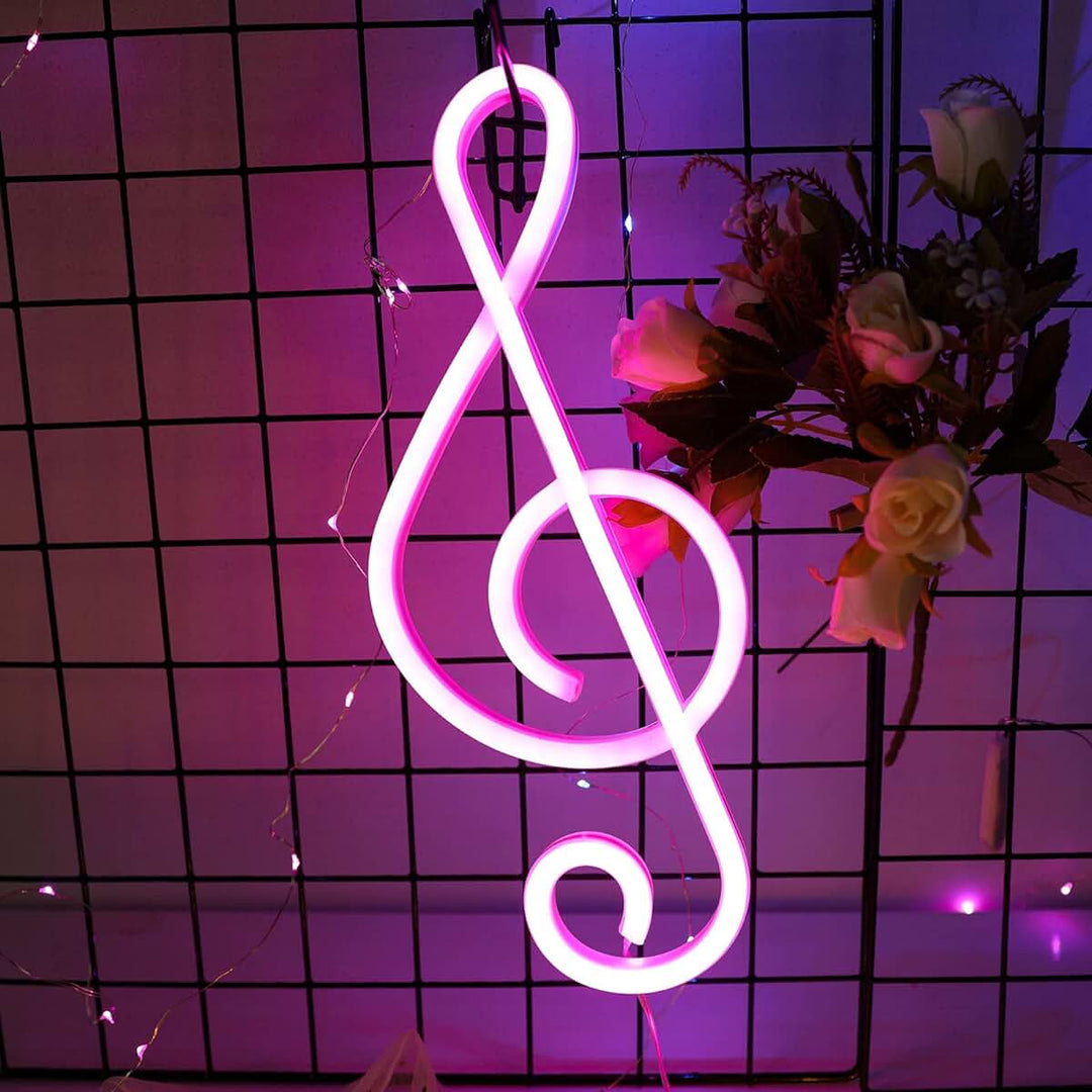 Treble Clef Neon Light in pink casting a vibrant and playful glow, adding a musical and stylish touch to any room.