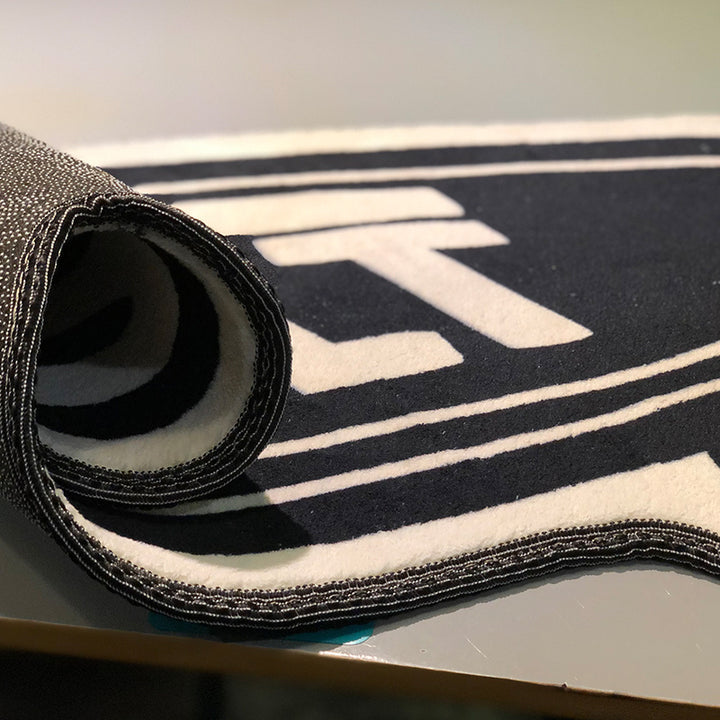 Close-up of the VibeCore Vans Vault Skateboard Accent Rug’s soft, plush material. This cute rug features a high-quality fabric with a bold, skateboard-inspired design. Perfect for adding comfort and style to any room, the non-slip backing provides safety and stability. Ideal for bedroom, dorm, or living room decor, this aesthetic rug brings a unique streetwear vibe to your space. Its durable construction ensures long-lasting use, making it an easy-to-maintain rug for your home.