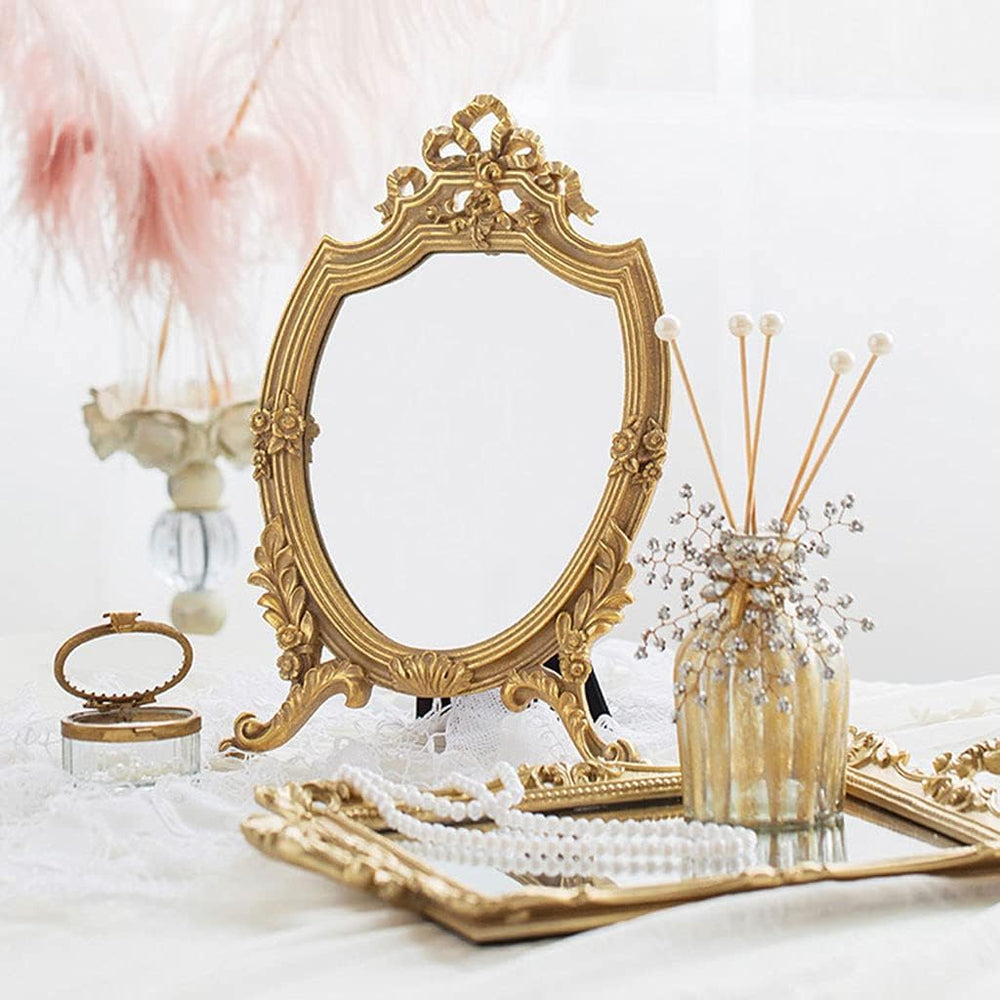 VibeCore Vintage Makeup Mirror placed on a table, highlighting its romantic plum blossom stand and clear reflection, adding vintage charm to the space.