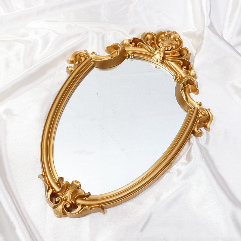 VibeCore Vintage Princess Coquette Mirror with golden resin frame and European carved design, adding royal elegance and vintage charm to any coquette or shabby-chic space.