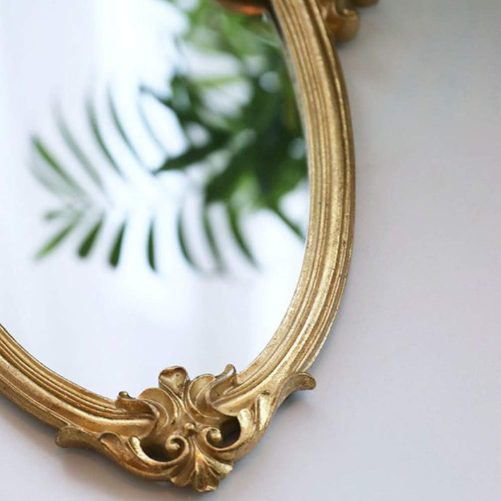 VibeCore Vintage Princess Coquette Mirror close-up, highlighting its luxurious golden frame, intricate European-inspired carved details, and high-quality resin craftsmanship, exuding elegance and royal charm.