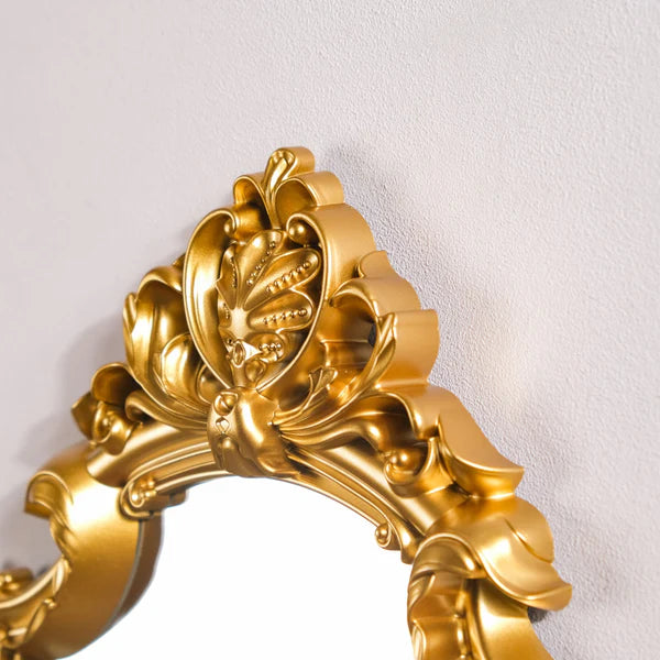 VibeCore Vintage Princess Coquette Mirror close-up of the intricate European-inspired carved details, showcasing the luxurious golden frame and smooth resin finish, emphasizing its vintage elegance and royal charm.