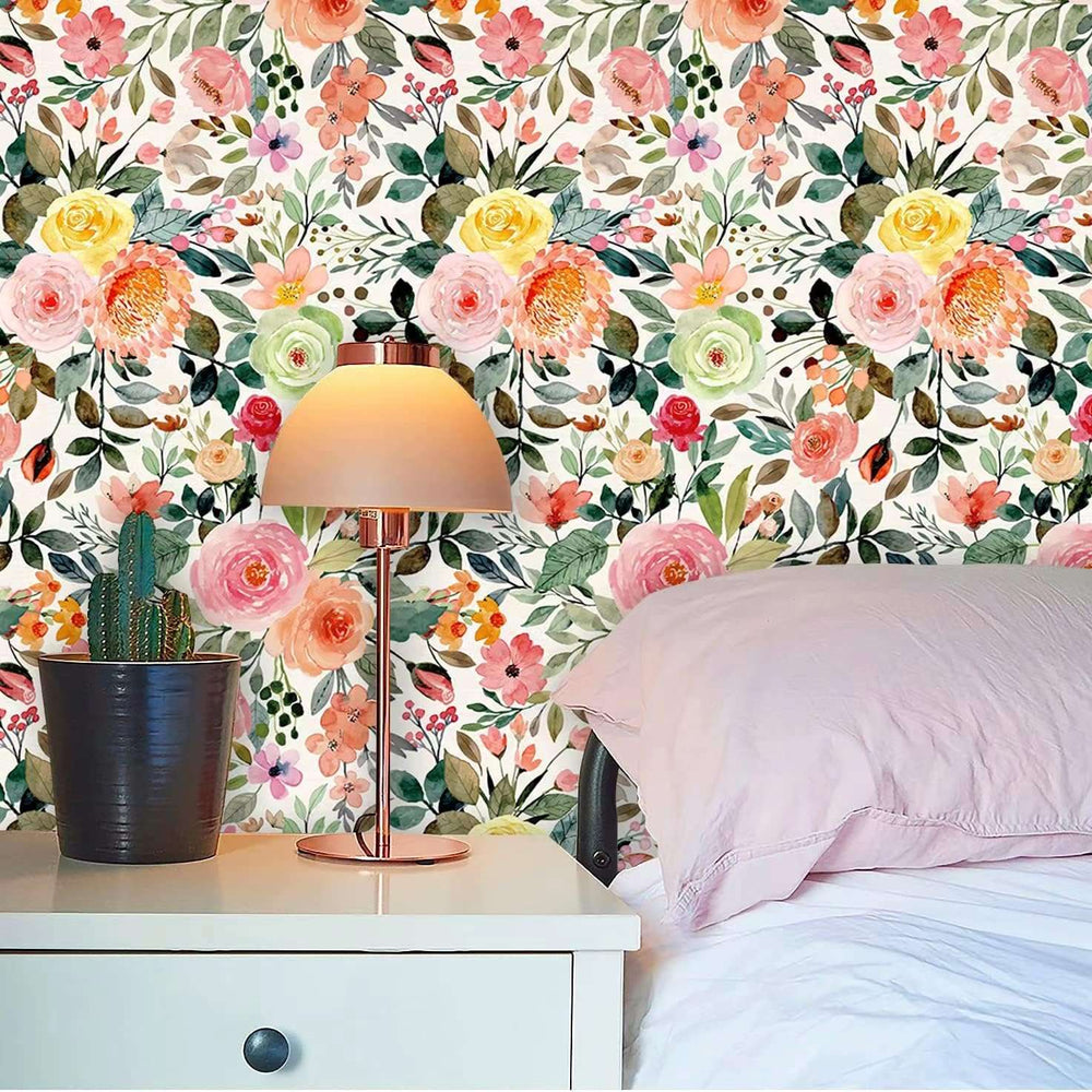 VibeCore Watercolor Floral Self-Adhesive Wallpaper in bedroom with soft floral design on accent wall, enhancing cozy and artistic atmosphere.