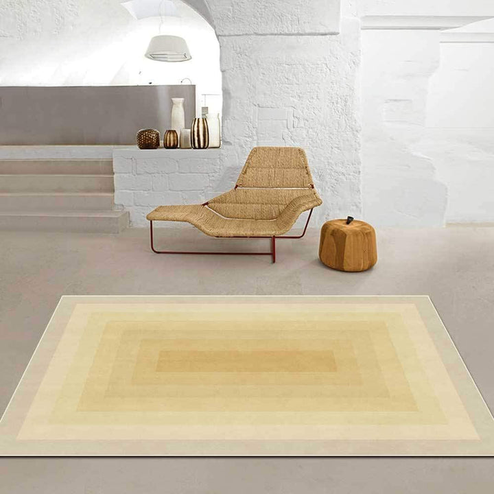 VibeCore Watercolor Gradient Area Rug Yellow on floor, featuring a smooth gradient of yellow shades that adds warmth and brightness to any room's aesthetic.