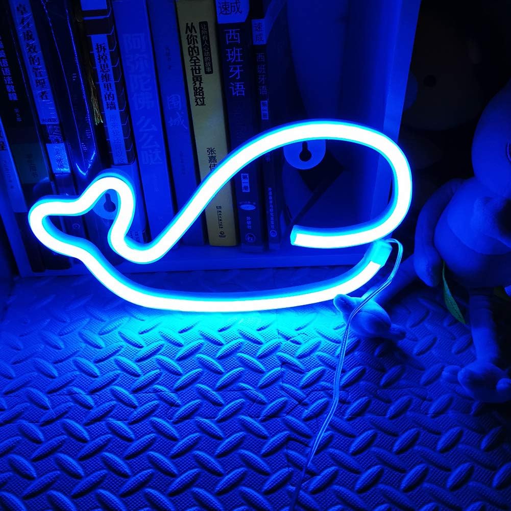 VibeCore Whale Neon Light Next To Plushie