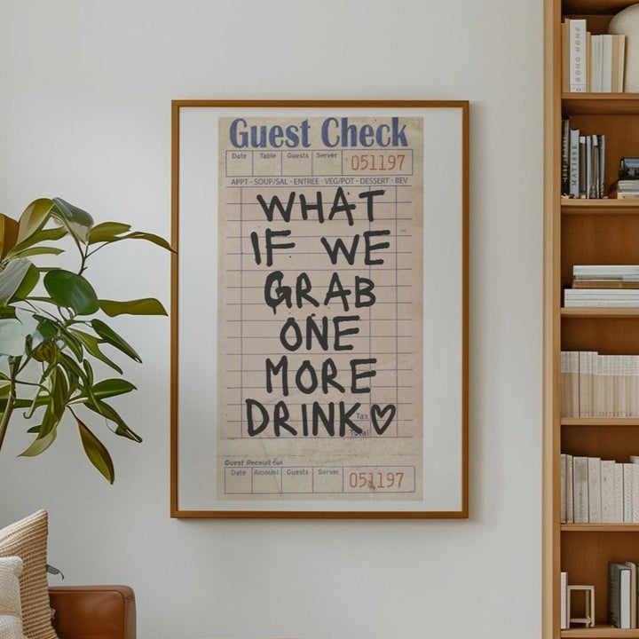 VibeCore 'What If We Grab One More Drink' Canvas Poster front view on the wall, featuring funky retro-inspired typography with a fun, girly preppy vibe. This playful print adds a touch of personality to your bedroom, dorm, or apartment, perfect for bar cart areas or any space in need of cute decor. Printed on durable cotton canvas with a semigloss finish for lasting vibrancy.
