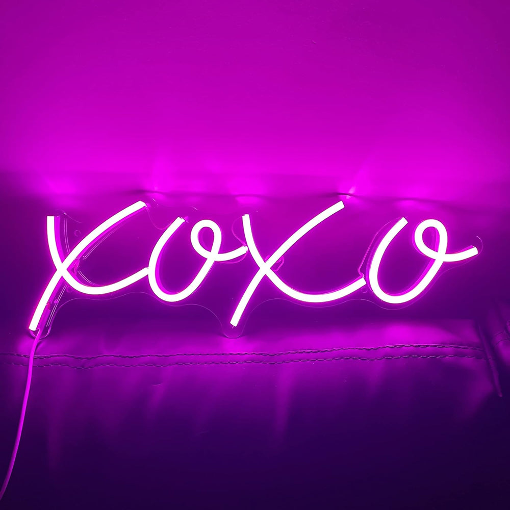 VibeCore XOXO Neon Light Pink On Top Of Couch