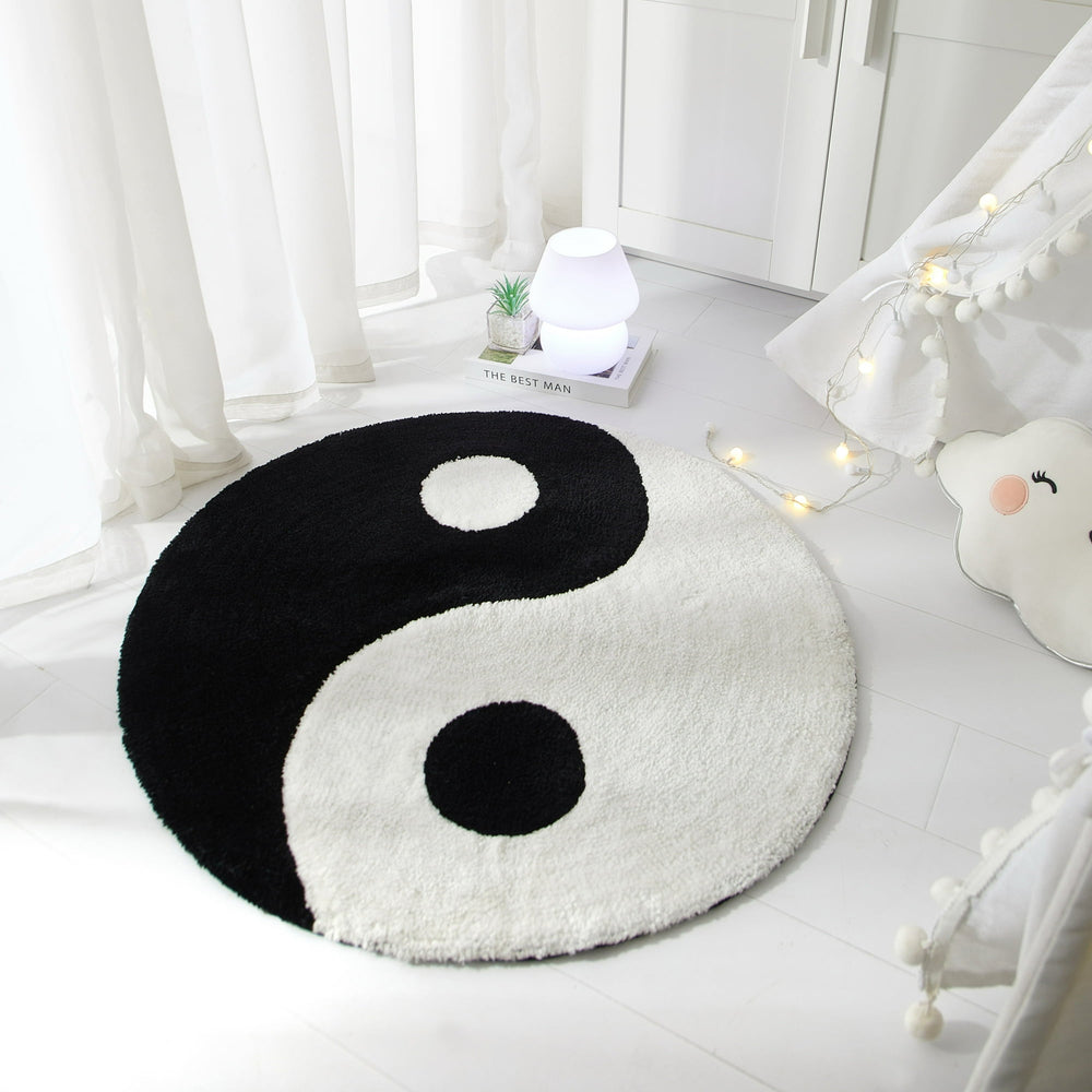 VibeCore Yin Yang Accent Rug Alternative Aerial View highlighting its sleek, round design. This black and white spiritual rug creates a balanced, modern vibe in any room.