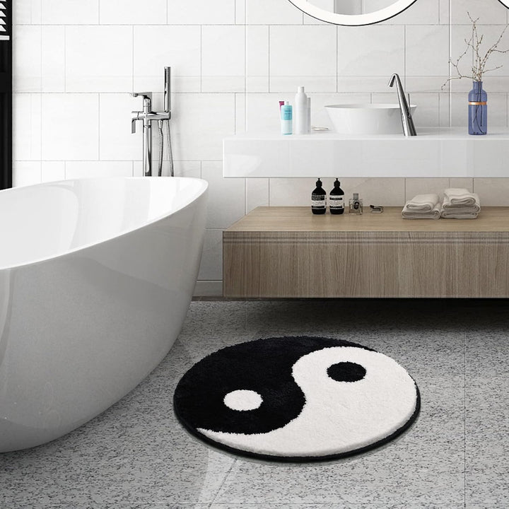 VibeCore Yin Yang Accent Rug in a bathroom, adding a harmonious black and white design. This cute round rug enhances bathroom decor with a serene, spiritual vibe.
