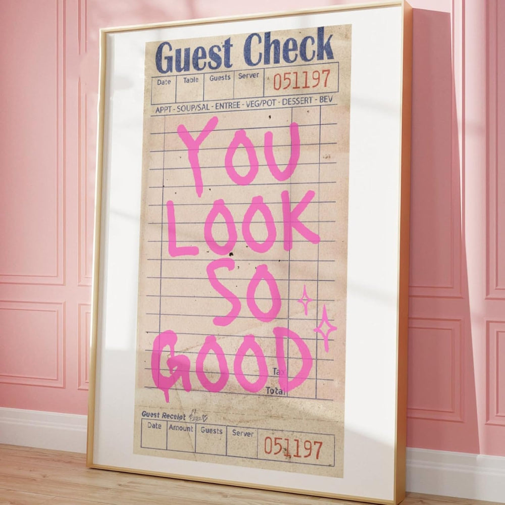 Close-up of VibeCore You Look So Good canvas print framed against wall, bold aesthetic typography art for playful bedroom, dorm, or apartment decor.