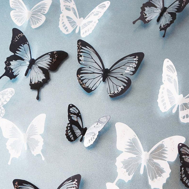 VibeCore 18 PCS Butterflies Wall Stickers in black and white, featuring detailed butterfly designs, perfect for applying to smooth surfaces like walls or windows to add a touch of nature to any room.