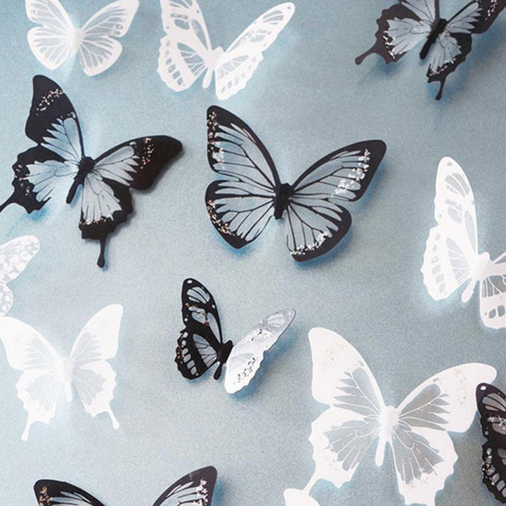 VibeCore 18 PCS Butterflies Wall Stickers in black and white, featuring detailed butterfly designs, perfect for applying to smooth surfaces like walls or windows to add a touch of nature to any room.