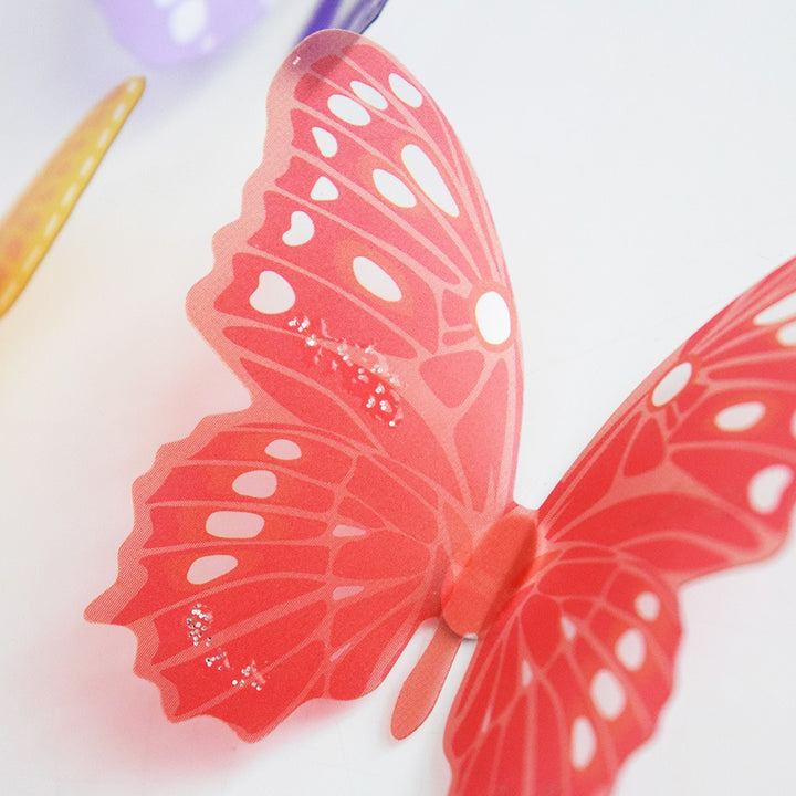 VibeCore 18 PCS Butterflies Wall Stickers close-up of a red butterfly design, showcasing vibrant color and intricate detailing, ideal for adding a bold, lively touch to any smooth surface.
