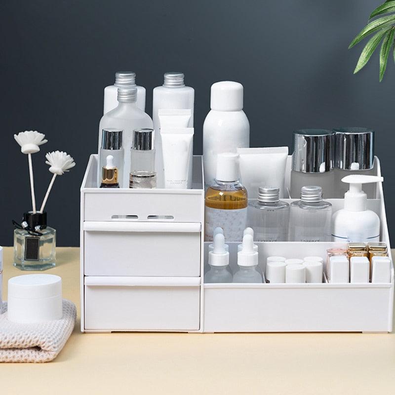 VibeCore 3-Layer Makeup Organizer in white, front view, displaying compact design with mini drawers, sleek storage solution for beauty products, skincare, cosmetics, space-saving, durable plastic, modern vanity organizer, bedroom or bathroom storage, organized beauty essentials, functional decor.