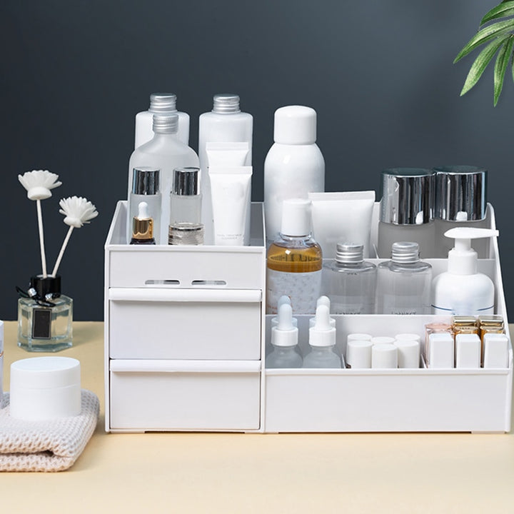 VibeCore 3-Layer Makeup Organizer in white, front view, displaying compact design with mini drawers, sleek storage solution for beauty products, skincare, cosmetics, space-saving, durable plastic, modern vanity organizer, bedroom or bathroom storage, organized beauty essentials, functional decor.