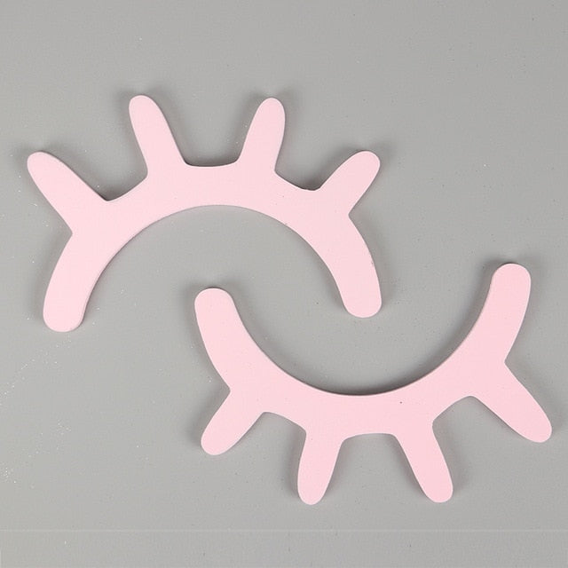 VibeCore 3D Eyelash Wall Sticker in light pink – modern, chic wooden wall decor for bedroom, dorm room, or apartment – lightweight, easy to apply and remove, stylish accent piece