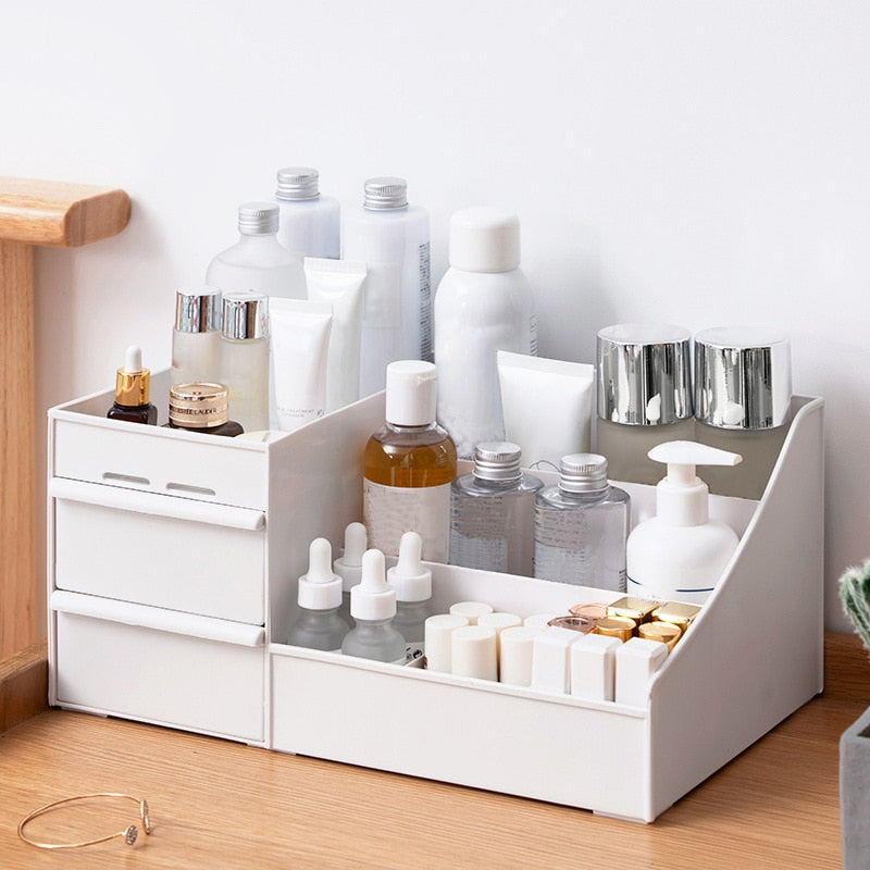 VibeCore 3-Layer Makeup Organizer white on a desk, neatly storing cosmetics, skincare, and beauty essentials, sleek and modern design, space-saving storage, multi-tier organizer, desk organizer, elegant vanity storage, compact and functional, makeup holder, tidy beauty products, stylish and practical.