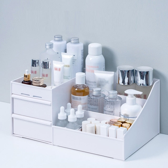 VibeCore 3-Layer Makeup Organizer white on a vanity, holding cosmetics, skincare, and beauty essentials, sleek and modern design, space-saving storage, multi-tier organizer, vanity organization, compact makeup holder, tidy beauty products, elegant and functional, stylish vanity storage, practical beauty organizer.