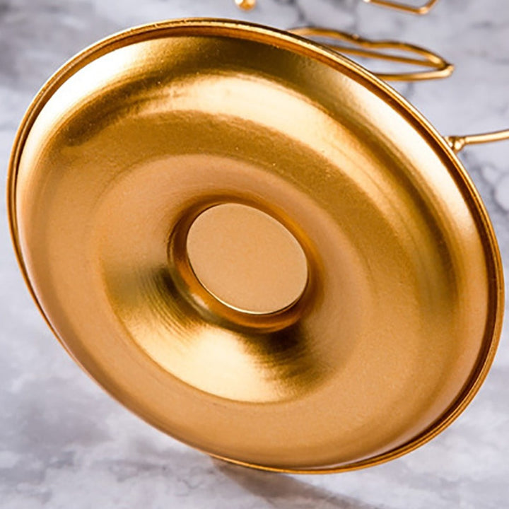 VibeCore Abstract Beauty Jewelry Stand base, crafted from durable gold iron metal, designed to hold jewelry with a stylish abstract female face design and a convenient tray for accessories.
