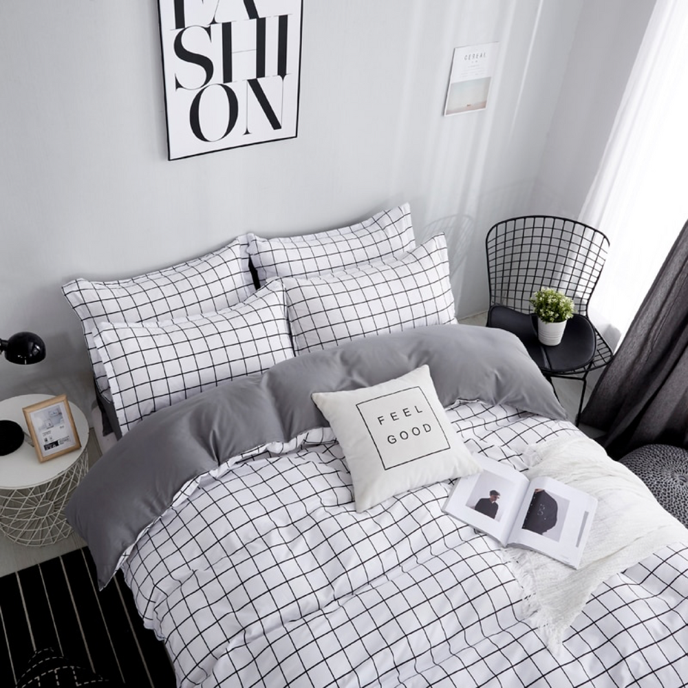 Side aerial view of the VibeCore Black and White Grid Bedding Set, showcasing its minimalist grid pattern and stylish modern design. Made from a soft cotton-polyester blend, this bedding set offers breathable comfort, durability, and fade resistance. Perfect for creating a trendy, Pinterest-worthy bedroom or dorm decor with timeless aesthetic appeal.