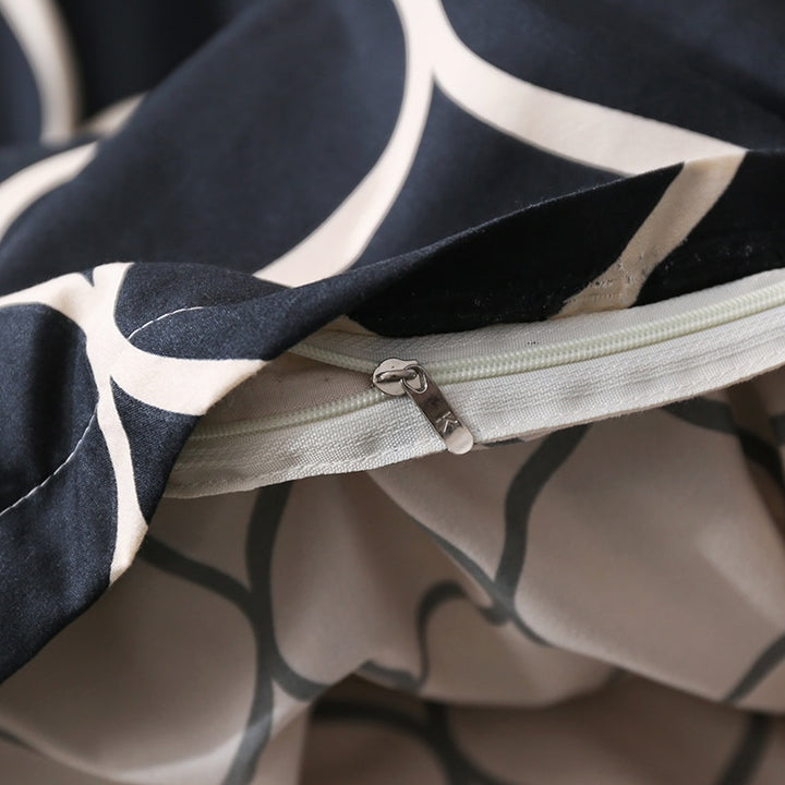 Close-up of the zipper detail on the VibeCore Aesthetic Black Beehive Duvet Cover Set, designed for secure closure and easy use. The durable zipper complements the bold black and gold beehive pattern, ensuring both style and functionality.