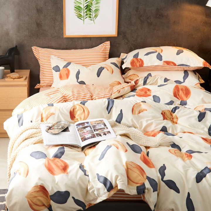 Front left view of the VibeCore Aesthetic Just Peachy Duvet Cover Set, showcasing soft peach tones and a cozy cotton-polyester blend. The duvet cover set brings a warm, inviting vibe to your bedroom or dorm room, offering both comfort and stylish charm for all seasons.