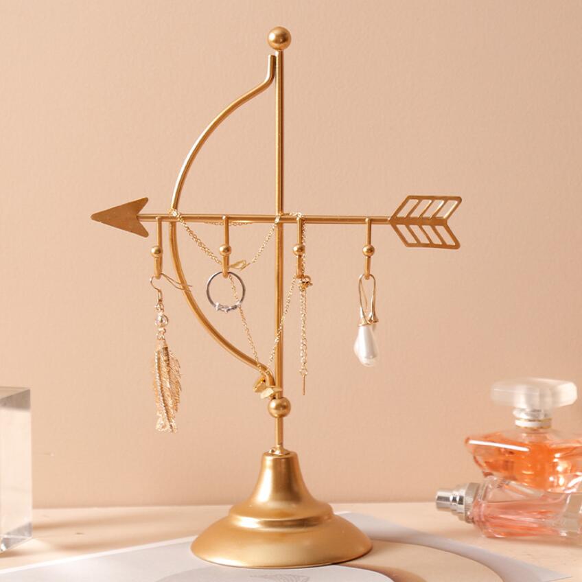 VibeCore Arrow Jewelry Stand in Gold, a sleek jewelry organizer for necklaces, earrings, and bracelets. Stylish, space-saving, tangle-free storage solution.