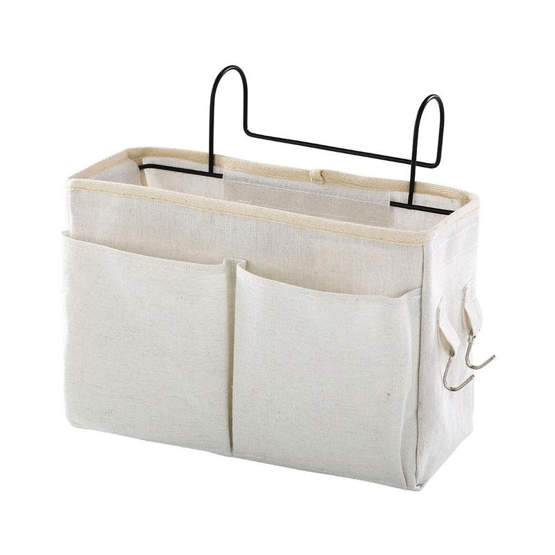 Space-saving white bedside caddy with multiple pockets and hooks for storing essentials like phones, tablets, and books. Durable, portable, and easy to hang over your bed or furniture, ideal for small spaces like dorms and apartments.