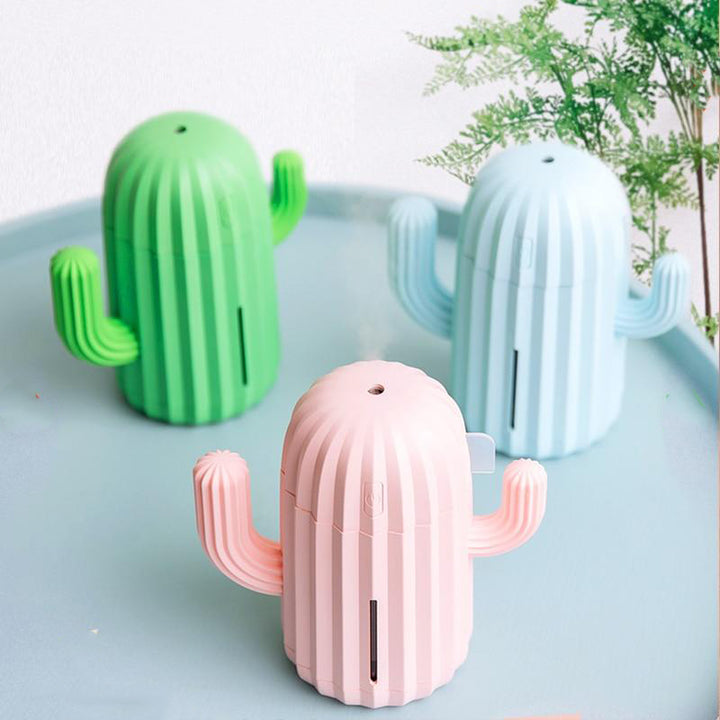 VibeCore Cactus Humidifier in all 3 colors (green, blossom, sky blue), featuring a playful cactus design, 340ml tank, essential oil compatibility, and quiet operation, perfect for refreshing any space.